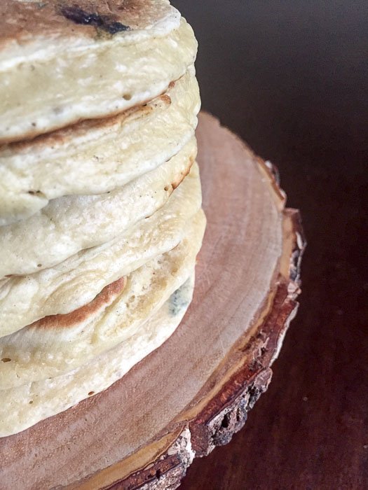 stack of fluffy blueberry pancakes.