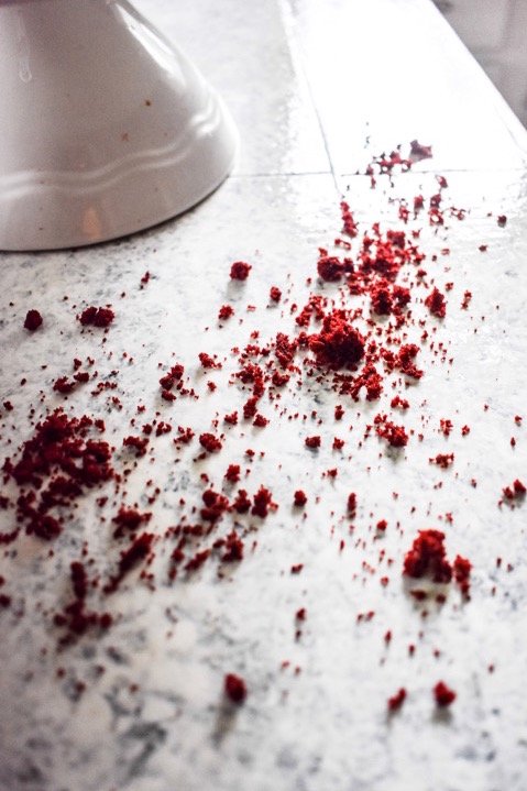 red velvet cake crumbs on countertop
