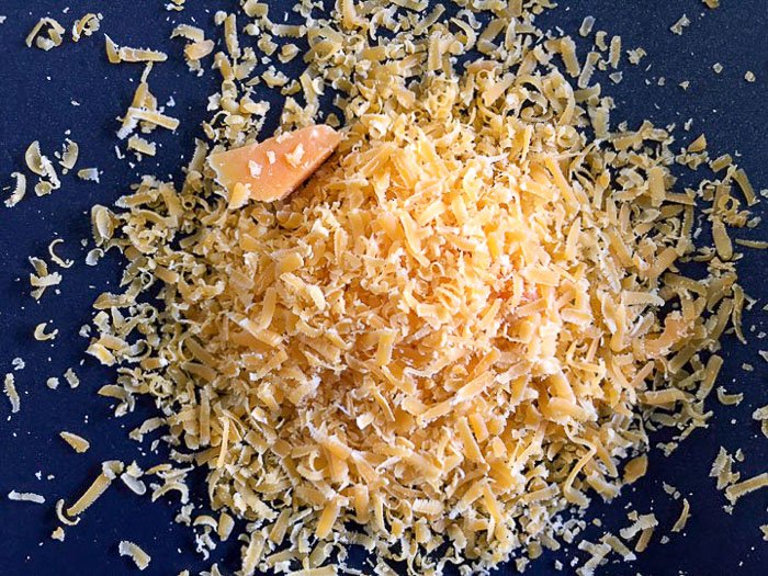 shredded mimolette cheese.