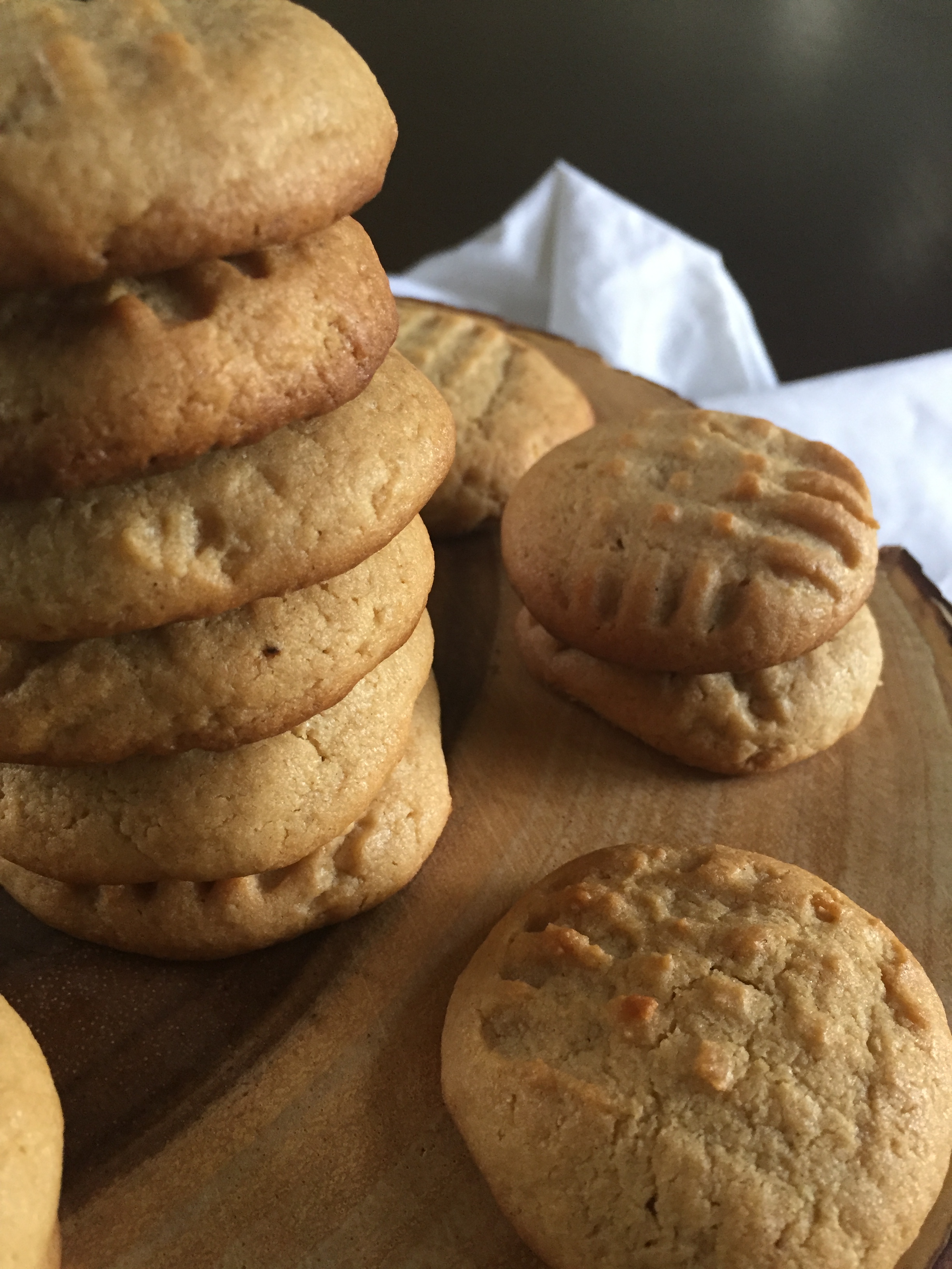 Spiced peanut butter cookies are classics with a twist of cinnamon, nutmeg, ginger, and clove. by Dash of Jazz