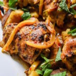 An easy slow cooker Moroccan chicken meal that is naturally gluten-free and Whole 30 compliant plus full of rich North African flavors. Recipe by Dash of Jazz