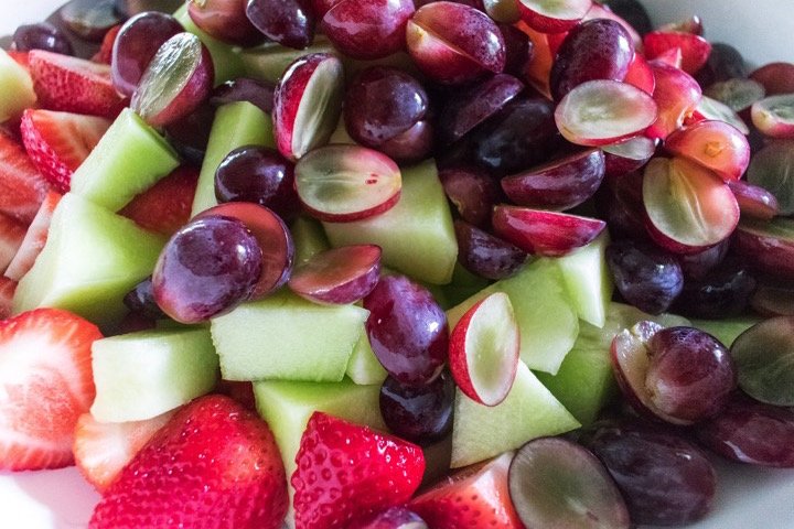 sliced grapes, honeydew melon, and strawberries