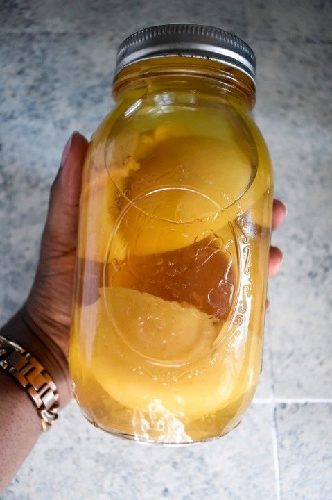 grapefruit scented vinegar in a mason jar
