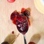homemade cherry jam on a spoon