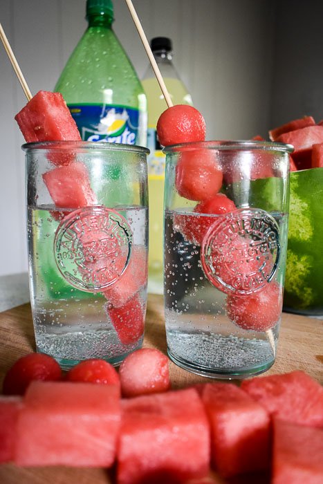 If you need an easy and delicious way to keep cool during the summer, make these frozen fruit coolers with the fruit and beverage of your choice!
