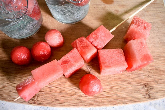 If you need an easy and delicious way to keep cool during the summer, make these frozen fruit coolers with the fruit and beverage of your choice!