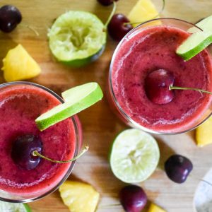 One easy step, two minutes, and five ingredients to make these delicious 2-minute frozen cherry pineapple margaritas! by Dash of Jazz