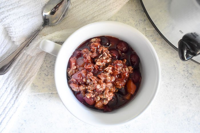 Make this set-it-and-forget-it dessert easily in your slow cooker or crock pot with cherries, apples, and a few other ingredients. Slow Cooker Cherry Apple Crisp by Dash of Jazz
