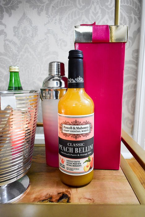 Powell & Mahoney Peach Bellini mixer is one of 6 easy bottle gift ideas for your host by Dash of Jazz.