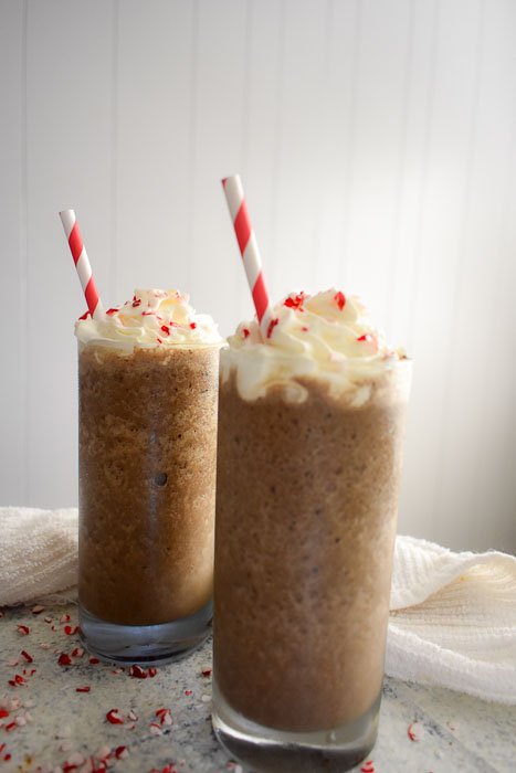 two frozen peppermint hot cocoa frappes by Dash of Jazz