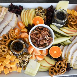 overhead view of a colorful and festive thanksgiving appetizer board