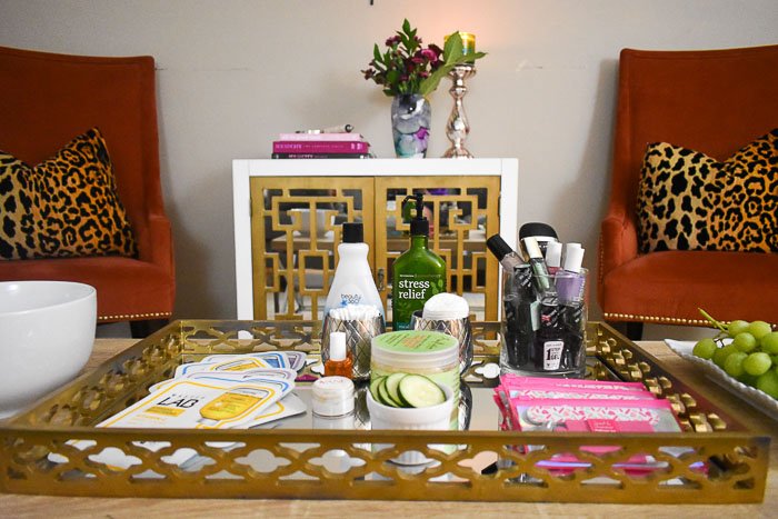 at-home spa party setup on coffee table with two chairs in background