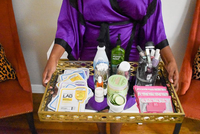 holding tray with at-home spa treatment tools