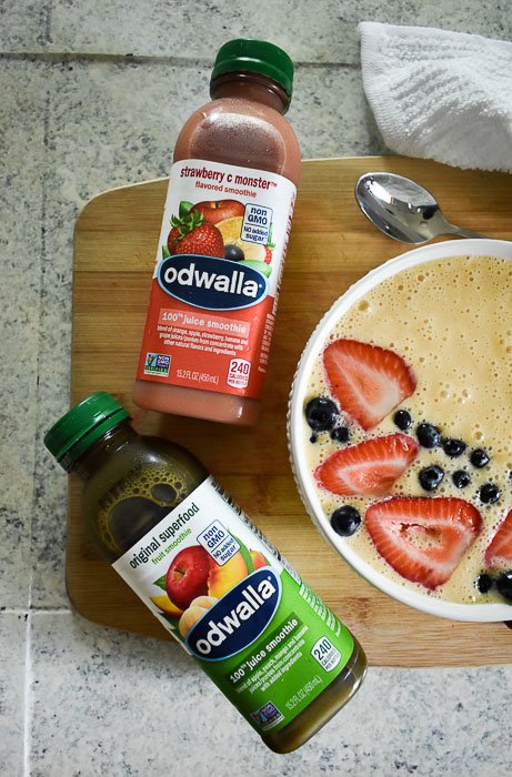 Odwalla strawberry C Monster and Original Superfood juice smoothies next to a smoothie bowl