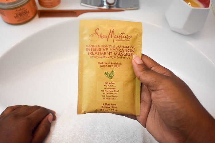 holding shea moisture intensive hydration masque pack