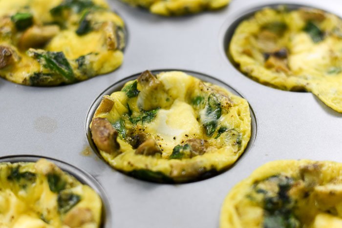 egg muffins with goat cheese, mushrooms, spinach, and garlic.