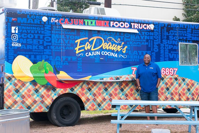 Owner-operator Jason Harry in front of EaDeaux's food truck in Houston, TX