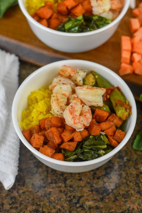 soul food power bowls with shrimp, sweet potato, yellow rice, greens, and okra