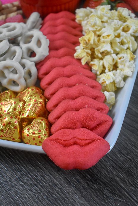 lip shaped smooch cookies on dessert board
