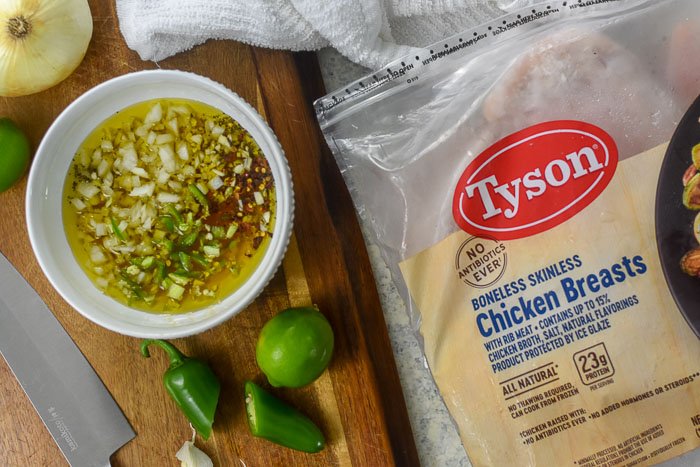Tyson chicken breast and marinade in bowl