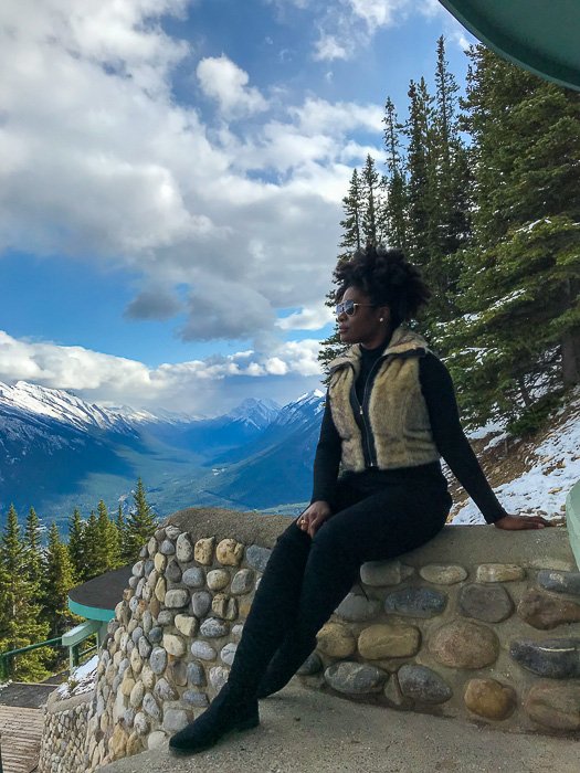 sitting on Banff, AB mountainside