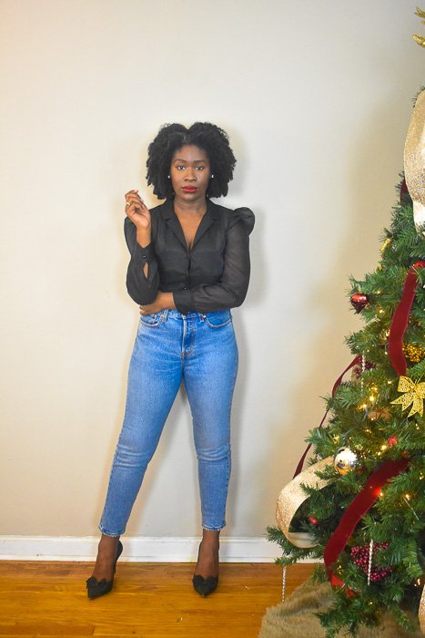 Dash of Jazz in organza blouse, mom jeans, and green bow pumps