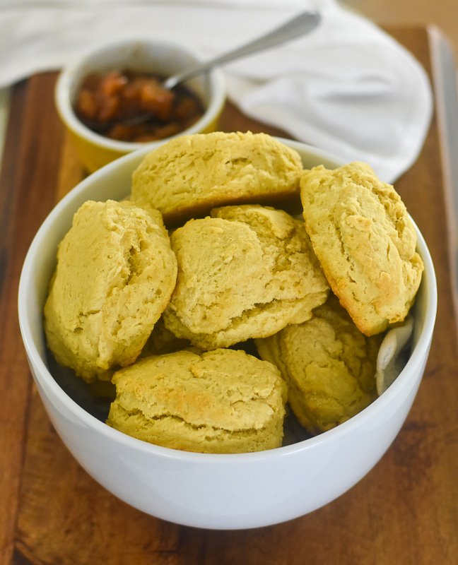 white bowl of fluffy dairy-free buttermilk biscuits.