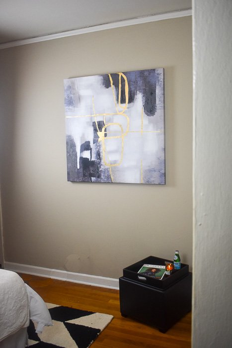abstract painting on guest bedroom wall