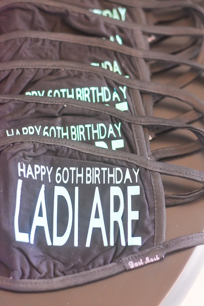 personalized face masks reading "Happy 60th Birthday Ladi Are"