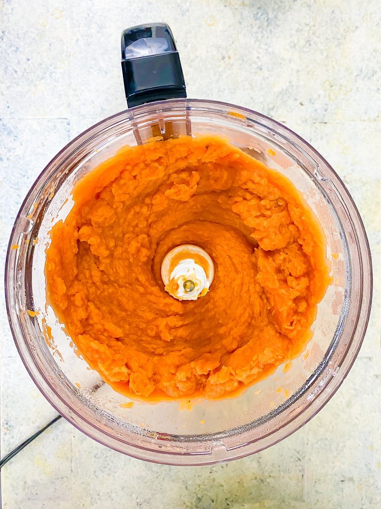 mashed and pureed roasted sweet potato in food processor.