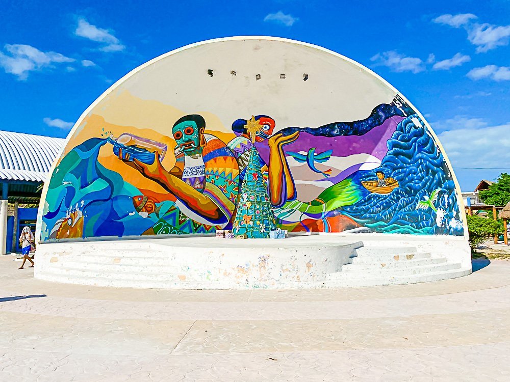 large dome shaped mural in middle of park