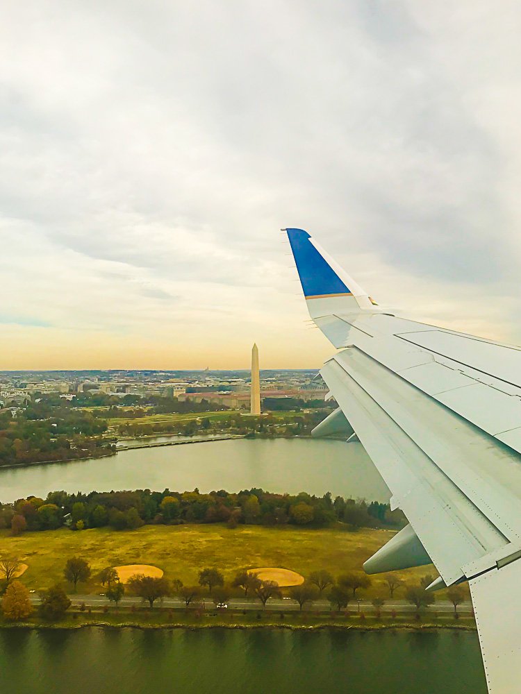 Washington monument viewed out of plane window.