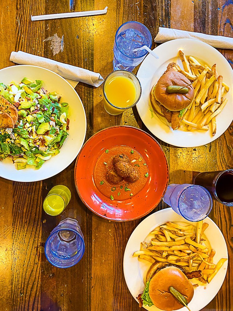table of dishes and drinks from Busboys and Poets in Brookland Washington, DC.
