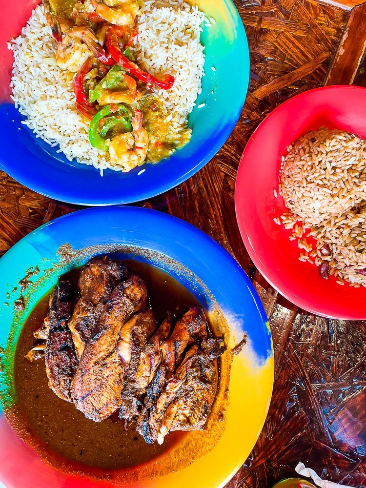 jerk chicken, garlic shrimp, and rice and peas at Reggae Hut in Houston.