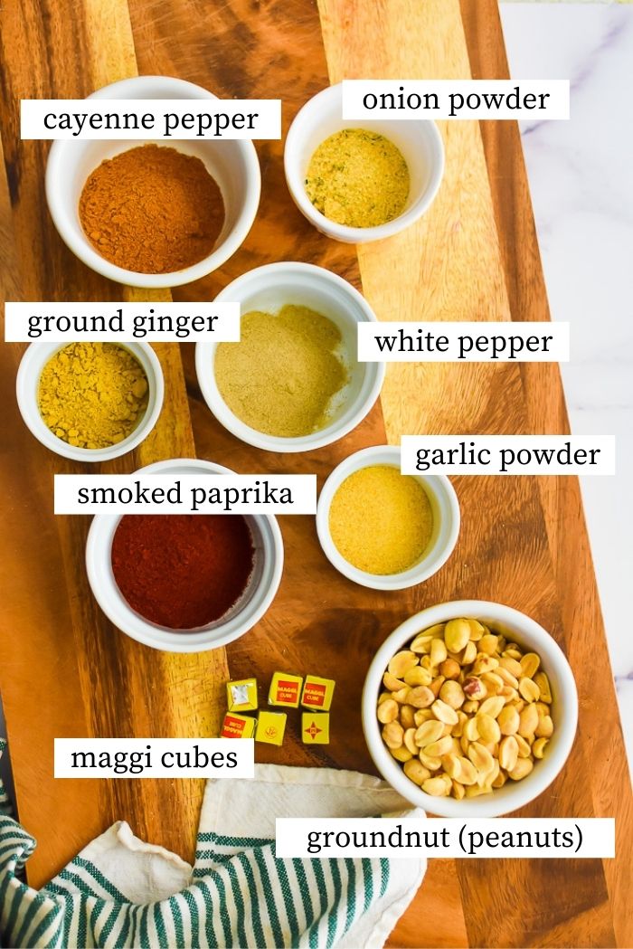 ingredients needed to make suya pepper on wooden cutting board.