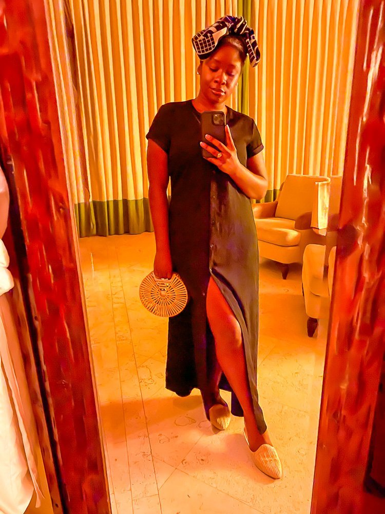 mirror selfie in Waldorf Astoria Cabo hotel room.