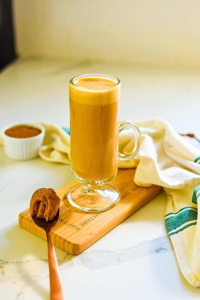 hot chai cookie butter latte in Irish coffee mug.