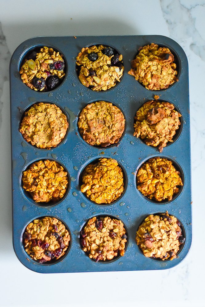 12 protein baked oatmeal cups in a cupcake pan.