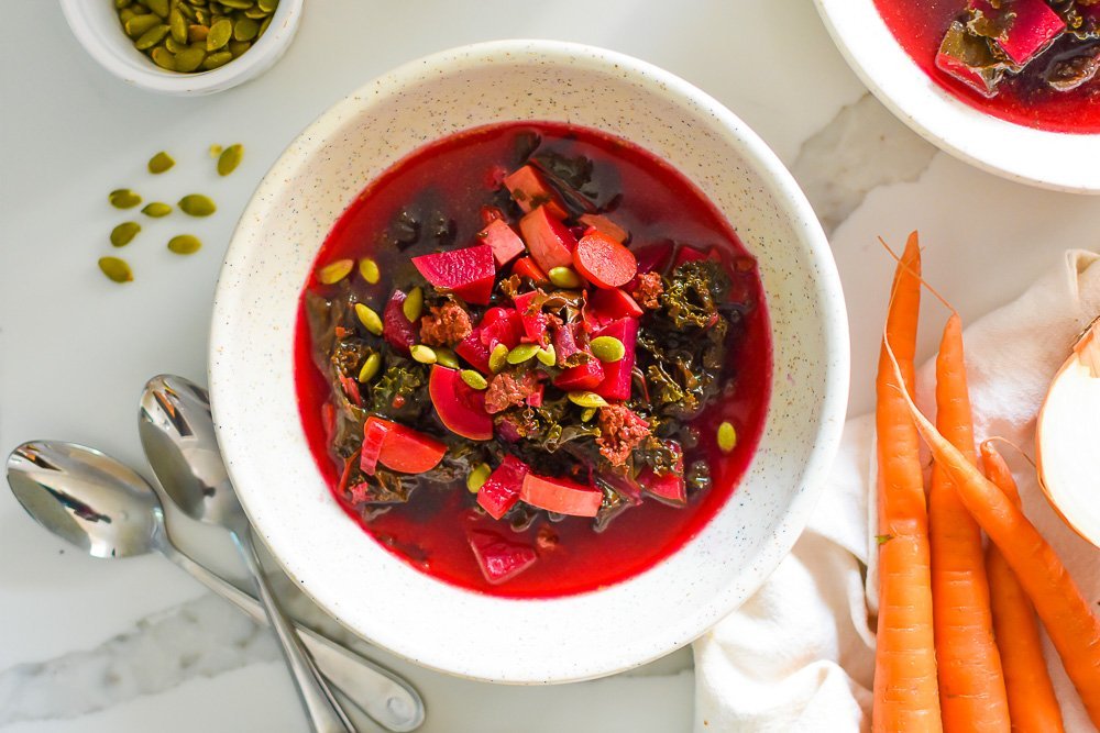 fall soup with beets, kale, ground beef, and carrots.