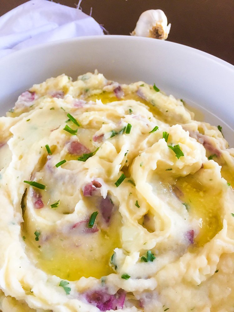 pools of melted butter in creamy garlic parm mashed potatoes.