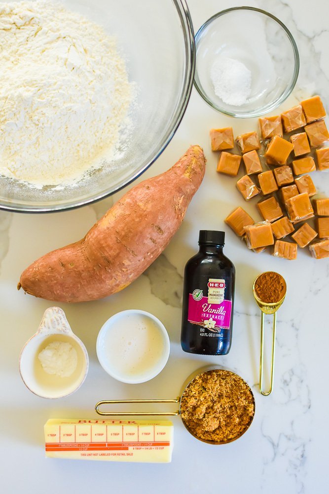 ingredients to make salted caramel sweet potato blondies on white granite counter top.