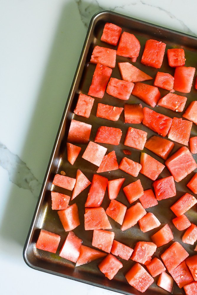 sheet pan of fresh watermelon chunks.