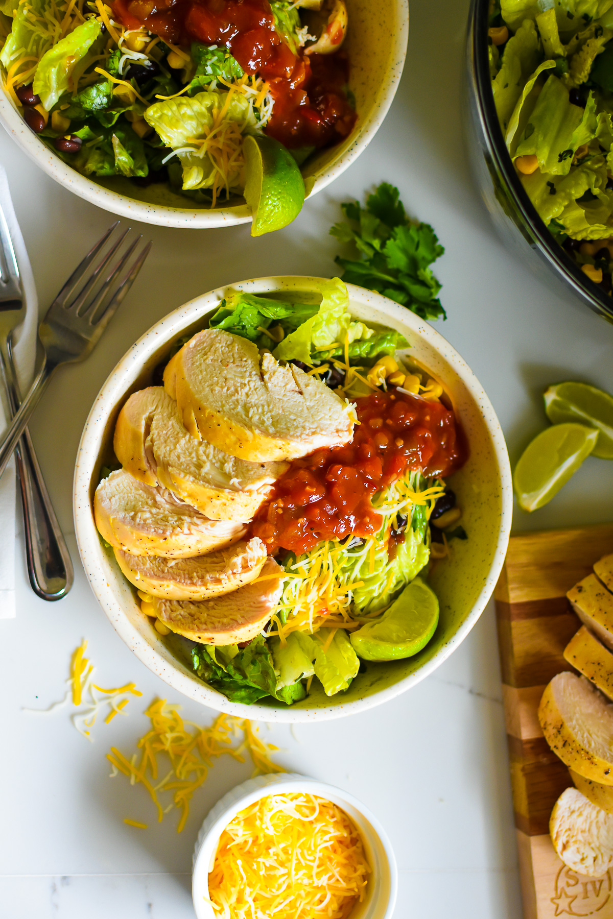 easy and delicious homemade chopped southwest salad with chicken served with salsa and fresh lime juice!