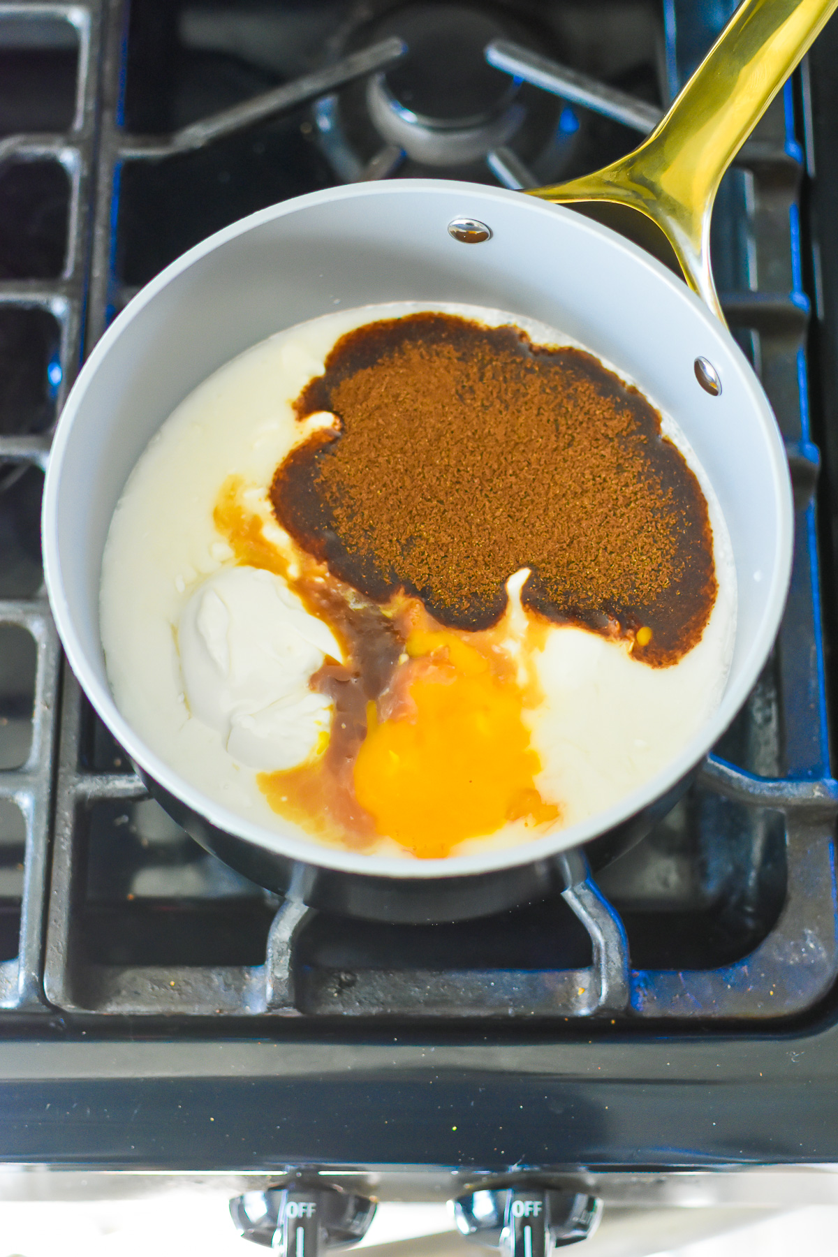 chai tea eggnog ingredients in small saucepan.