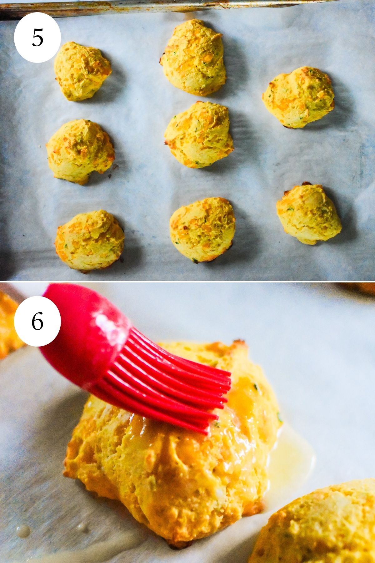golden brown baked cheddar cornmeal biscuits being brushed with melted butter.