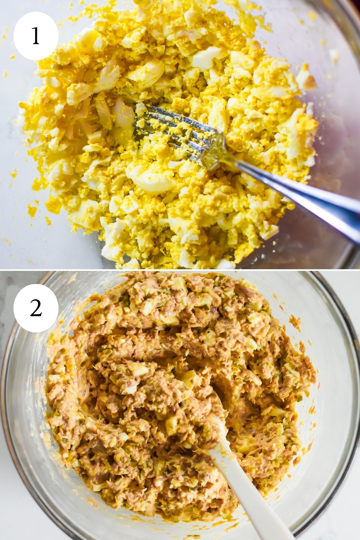 chopped egg and mixed tuna salad with egg and no celery in glass mixing bowl.