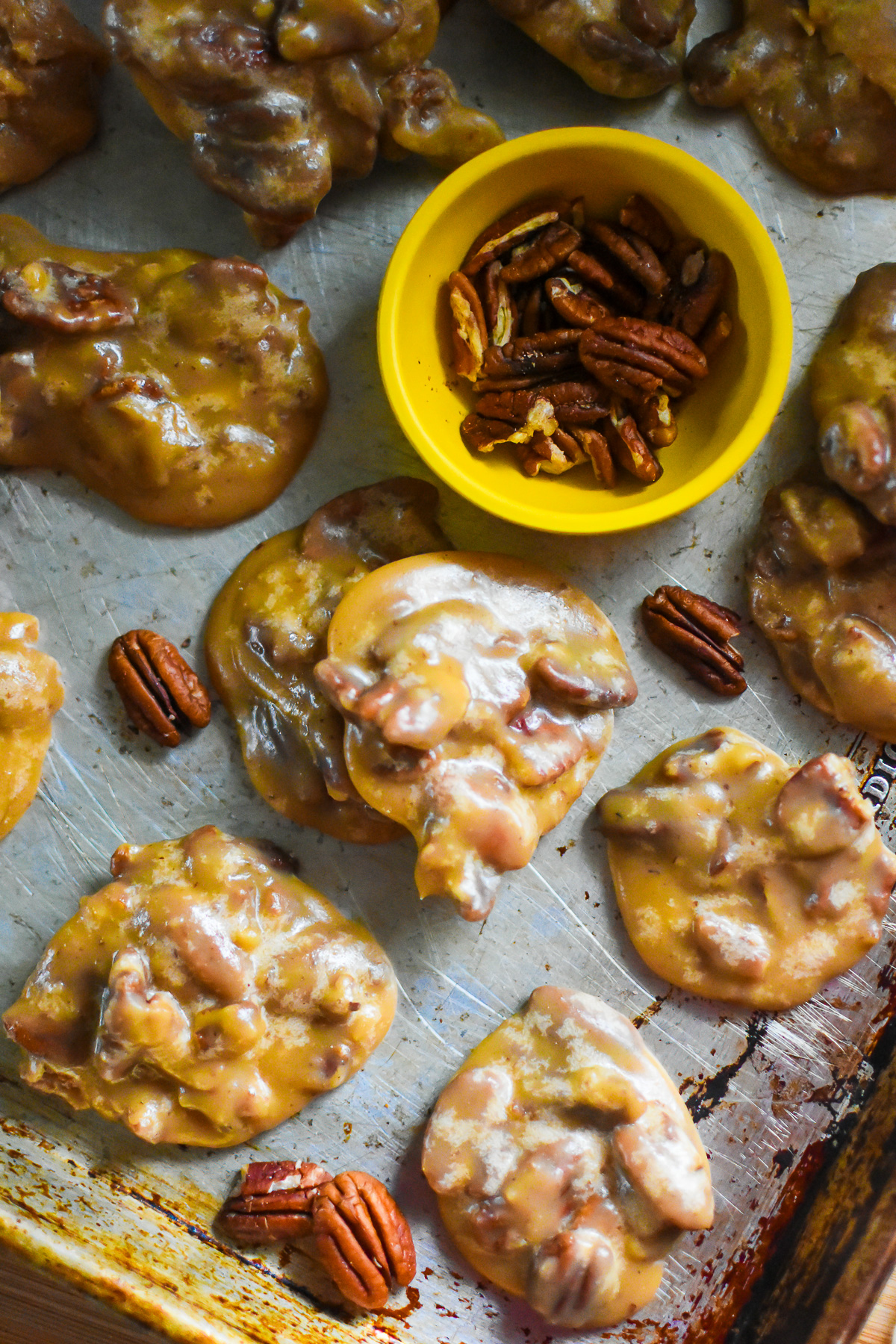NOLA sweet pecan praline candies with whole pecans.
