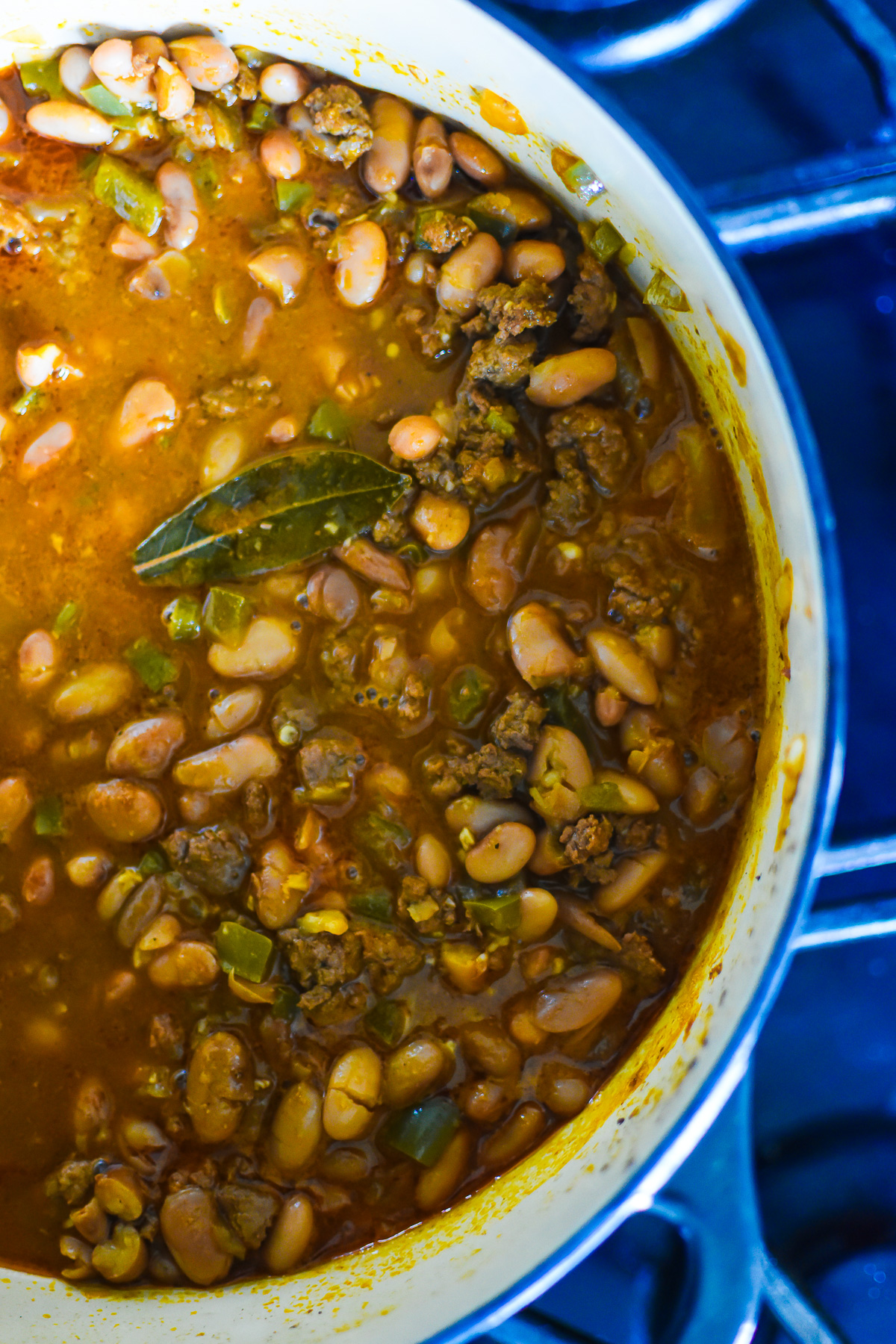 old fashioned Texas pinto bean ground beef soup in Dutch oven.