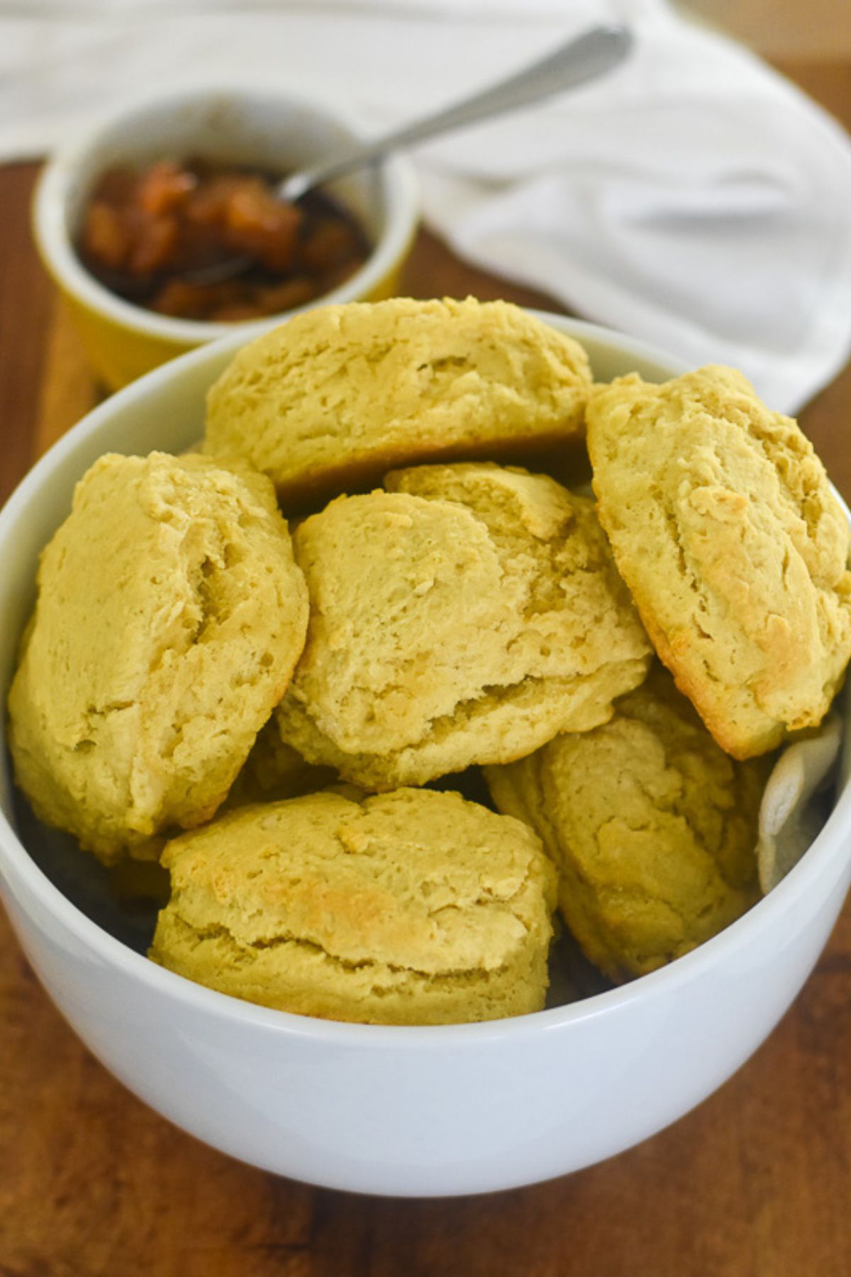 bowl of freshly-baked buttermilk biscuits from scratch.